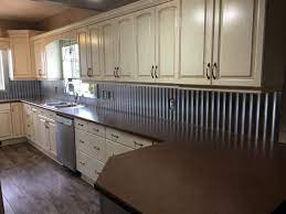 These galvanized kitchen canisters are perfectly shaped to store coffee, sugar or bread. Ingenious Ways To Use Galvanized Steel In The Kitchen Union Galva Steel