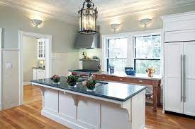 Awkward spaces call for creative design solutions. Great Solutions For Low Kitchen Windowsills