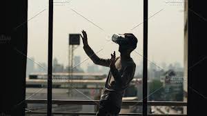 Silhouette Of Young Man Watching Movie In Vr Headset And Have Virtual Reality Experience On Hotel Room Balcony Virtual Reality Silhouette Movies