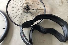 May 11, 2020 · you do it by holding the wheel between your legs and gripping the tire right at the low section. How To Change A Bike Tire Florida Hikes