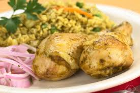 Arroz con pollo peruano takes signature flavors from peru and enhances moist chicken, fluffy rice, & fresh veggies, turning it into your new favorite meal! Peruvian Dish Called Arroz Con Pollo Rice With Chicken Which Is Made Of Rice Peas Corn Aji Hot Pepper Cilantro Served With Chicken And Salsa Criolla Onion Salad Stock Photo Picture And