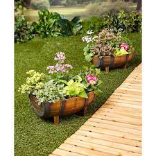 Outdoor gardens barrel planter lawn and garden garden containers garden yard ideas front yard container gardening little gardens bird house. Fwmr3bf1icvqcm