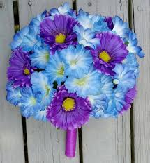 A daisy is a great gift to send in a just because bouquet! Blue And Purple Wedding Bouquet Daisy Wedding Bouquet Petunia Wedding Bouquet Silk Flower Daisy Wedding Flowers Silk Flower Wedding Bouquet Wedding Bouquets