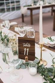 15 Simple But Elegant Wedding Centerpieces For 2019 Trends Emmalovesweddings Wedding Table Numbers Diy Wedding Table Wedding Table