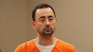 US Olympic gymnastics doctor Larry Nassar pleads guilty to multiple charges  of sexual assault