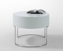 Whether you're buying a whole new suite of bedroom furniture or a looking for a bedside table with personality, you'll find it in crate and barrel's nightstand collection. Modern Liv White Lacquer Round Nightstand