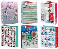 Get large gift bags christmas delivered to your door in as little as 2 hours. Set Of 6 Extra Large Christmas Gift Bags With Handle Tag Mixed Designs 5055711272593 Ebay