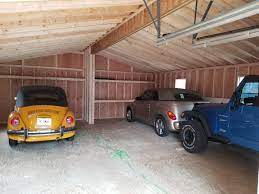 The Inside Of Our Two Car Garage Building As You Can See You Can Squeeze More Than Just Two Cars Inside Garage Builders Garage Two Car Garage
