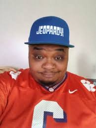 watching jeopardy with lucky hat