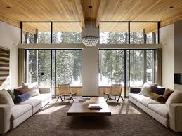 Love the mixed textures here with the fabric and wood details. Mountain House Living And Dining Room Decor