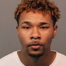 Home search of parolee reveals drugs and stolen firearm, police say