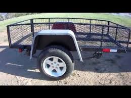 It is made of wood, with a steel chassis and axle to hold the load carriage. Build A Diy Utility Trailer For 300 Part 1 Youtube