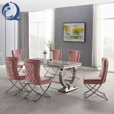 Gather around the table with comfortable dining room chairs. China Luxury Marble Dining Table Eurpean Style Furniture Dining Room Table Set Stainless Steel Base Dining Table And Chair China Dining Table And Chair Ariana Dining Table
