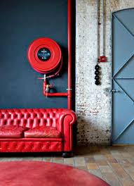 Simple teenage boy's room with solid colors and monogram. Red Interior Colors Adding Passion And Energy To Modern Interior Design