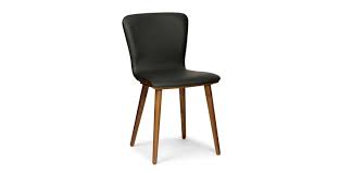 It's a part of the home the family gravitates to and hence it needs to be functional and inviting. Black Sede Leather Walnut Dining Chair Article
