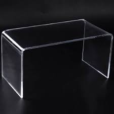 Available in black and clear finish, this coffee table will add a touch of modernity to any room. Acrylic Waterfall Coffee Table Wayfair