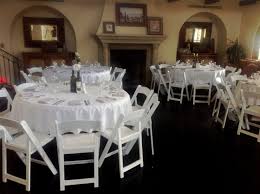 Small Wedding At The Woods Venue In Eastlake White Linens Paired With White Napkins And White Resin Folding Chairs With A Lifetime Tables White Napkins Chair