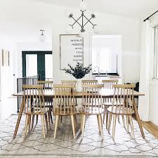 This one may seem obvious but the best way to make a rug work with a round dining room table is to get a round rug. The Right Rug Size For Your Dining Room Ruggable Blog