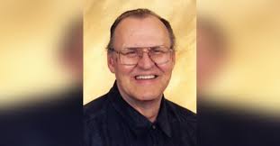 Obituary information for John E Wolfe