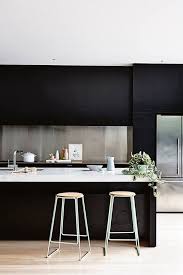 Black And Wood Kitchen Design Create A Minimalist European Look Using Black Kitchen Cabinets Pair Black Wood Storage Cabinets With Kitchen Interior Home Decor Kitchen Modern Kitchen Design