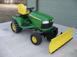 Transforming Your Riding Lawn Mower Into The Ultimate Snow Mover Riding Lawn Mowers Lawn Mower Snow Plow Lawn Mower