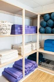 Plant hook, painted, turned upside down mounted on my wall. 8 Yoga Mat Storage Ideas Yoga Mat Storage Yoga Studio Design Yoga Mat