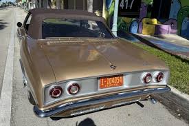 Image result for Sierra Tan 1965 Corvair