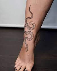 25 Snake Tattoos On Foot And Meanings Tattoos Foot Tattoos Snake Tattoo Design