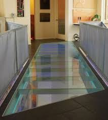 Glass Walkway Installed In Hallway Where Bedroom Wall Will Be Moved To Cover Up Gaps In Wood Floor Need To Remo With Images Flooring Glass Floor Laminated Glass