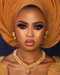 This gelled bang style is perfect for fancy occasions. Gele Styles For Round Face