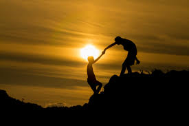 Silhouette of helping hand of a friend. - Eagles Nest