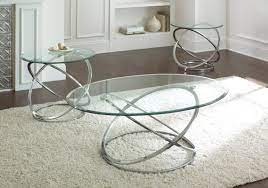 Save 5% on 2 select item (s) each of the pieces in this coffee table set are equipped with a bottom shelf for storing magazines, games or decorative art. Ashley Down 3 Piece Coffee Table Set 3 Piece Coffee Table Set Silver Coffee Table Coffee Table Setting