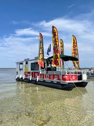 These waterproof, battery powered speakers can bring the tunes. Panama City Florida Food Boat At Shell Island Serves Barbecue Snoballs