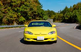 Image result for Pastel Yellow 2000 Tiburon
