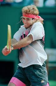 It seems that the long spiked hair worn during the late 80s was a wig or a weave. 7 Lessons Andre Agassi Taught Us About Hair Gq