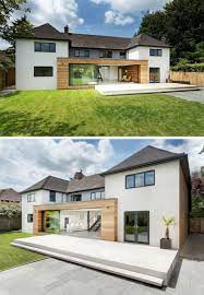 14 Examples Of British Houses With Contemporary Extensions Light Wood Paneling And A Sliding Glass Door House Cladding British Houses House Extension Design