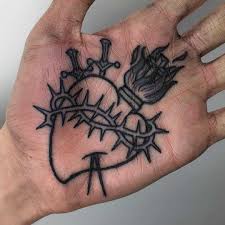 Sacred Heart Tattoo Inked On The Left Palm By Luke A Ashley Sacred Heart Tattoos Heart Tattoo Palm Tattoos