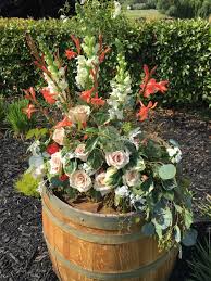 When decorating a church altar for a ceremony such as a wedding or funeral it is crucial that floral arrangements are large enough to be seen by the congregation. L Shape Rose Arrangement For Altar By Flower Fiesta