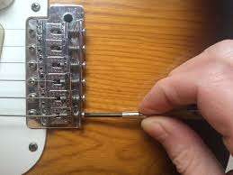 Always adjust the action at the nut first though, if it needs it (after making sure the neck is set right of course). Setting Intonation On A Strat Haze Guitars