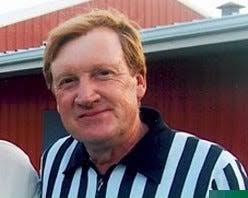 Bob Knight no threat to men running UE Purple Aces scorers table