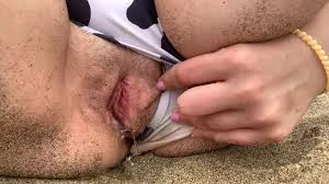 Chubby pussy blonde pees in the sand - ThisVid.com
