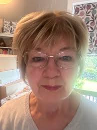 I'm looking for a recommendation for a hair salon for a middle aged woman  with naturally greying hair (I like the grey!). I'm specifically looking  for a salon where the hairdresser is