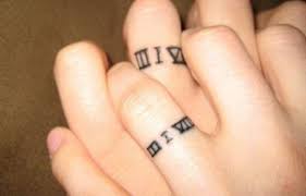 Kid initial tattoos one of my favorite tattoo ideas for parents is this braille tattoo on my wrist. 10 Great Wedding And Engagement Ring Tattoo Ideas Tatring