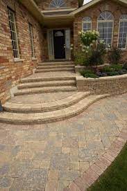 Using these ideas will help you decorate your front porch in an easy way. Unilock Front Entrance With Steps And Stonehenge Paver Photos Patio Pavers Design Diy Patio Pavers Front Yard Landscaping Design