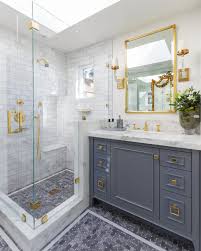 For a trendy vibe, consider brushed brass bathroom hardware. Shower Door Trends Brushed Gold Basco Shower Doors