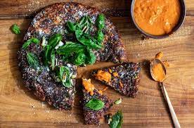 Giant Couscous Cake With Roasted Pepper Sauce Recipe Nyt Cooking Stuffed Peppers Pepper Sauce Recipe Nyt Cooking