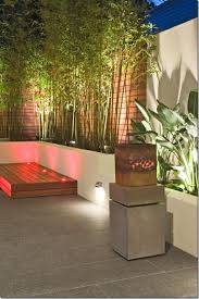 Explored Garden Lighting Ideas On Pinterest See More Ideas About Garden Lighting Ideas Contemporary Landscape Design Courtyard Design Modern Landscaping