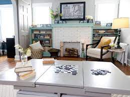 It is a central piece of game room furniture that draws the eye, provides ample space for each player, and provides a safe area for drinks that won't damage the playing surface. Family Room With Custom Storage Game Table Hgtv