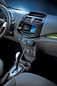 inside of chevrolet s new microcar the spark arriving in july super cute this would be amazing if you lived i chevrolet spark chevrolet chevrolet spark ls