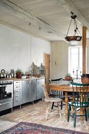 gosto muito do estilo rustico desta cozinha os armarios em inox trazem modernidade design industriel cuisine interieur de cuisine cuisine inox